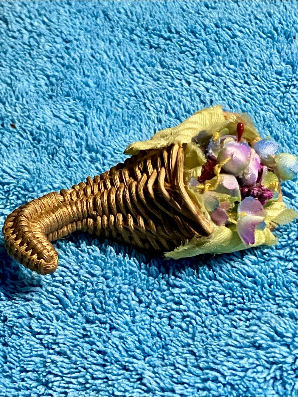 1992 Avon Fall Cornucopia Wicker Brooch  with silk flowers in burgundy, blue